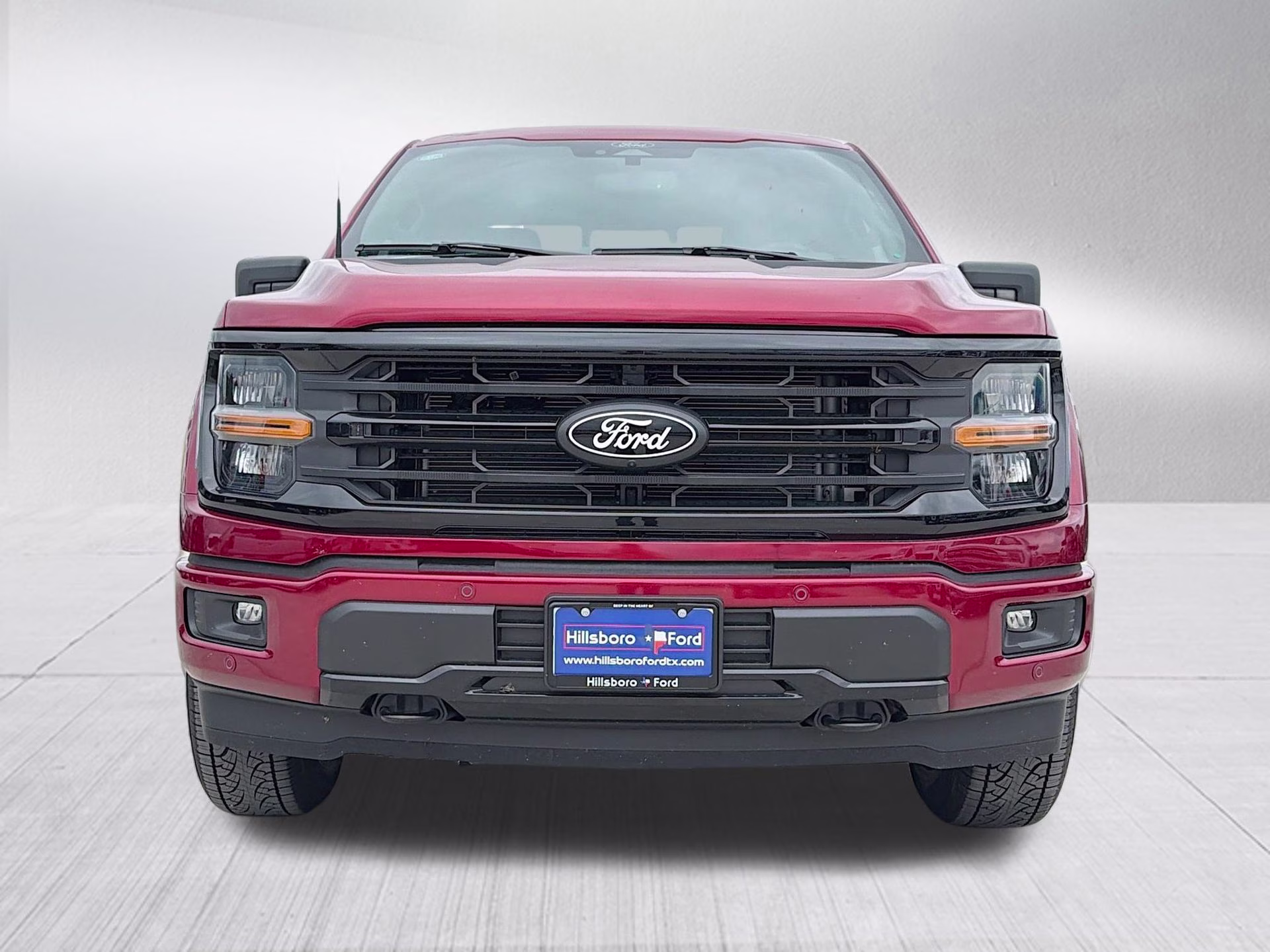 2026 Ruby Red Metallic Tinted Clearcoat Ford F-150 XLT 4X4 Truck