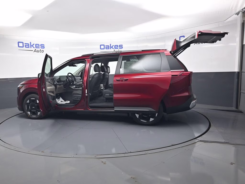 2026 Flare Red Kia Carnival EX FWD Van