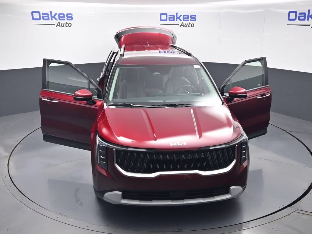 2026 Flare Red Kia Carnival EX FWD Van