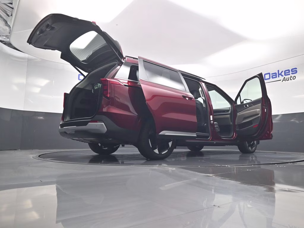 2026 Flare Red Kia Carnival EX FWD Van
