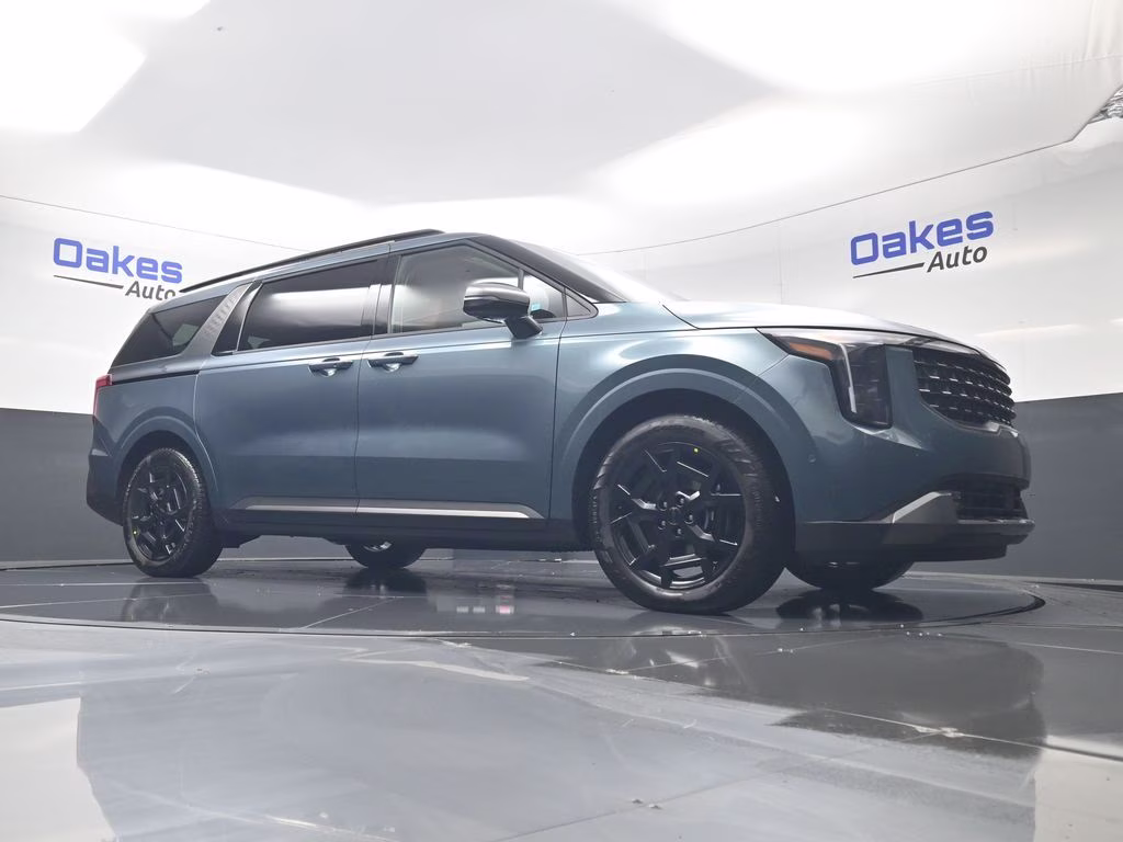 2026 Astra Blue Kia Carnival Hybrid SX FWD Van