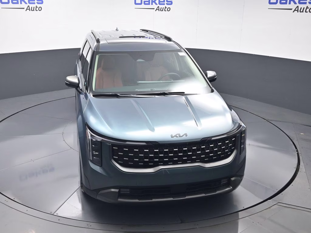 2026 Astra Blue Kia Carnival Hybrid SX FWD Van