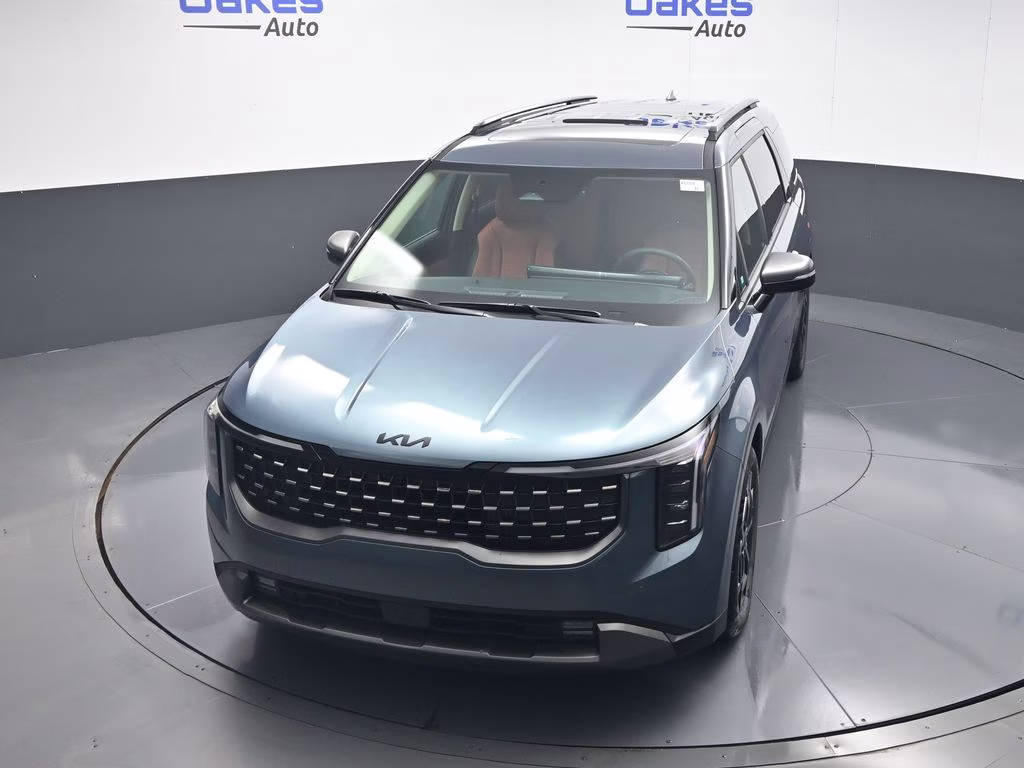 2026 Astra Blue Kia Carnival Hybrid SX FWD Van