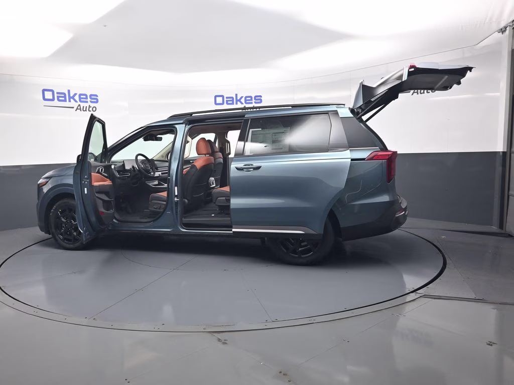 2026 Astra Blue Kia Carnival Hybrid SX FWD Van