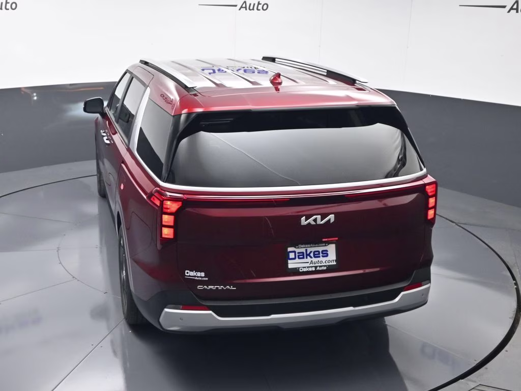2026 Flare Red Kia Carnival EX FWD Van