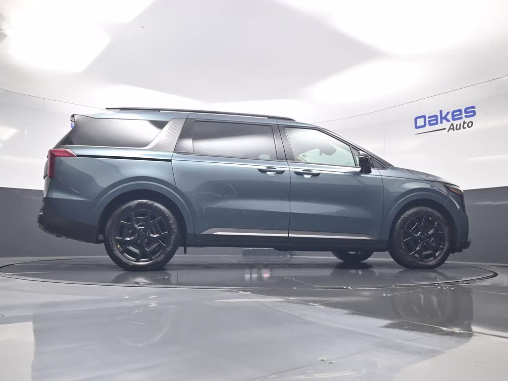 2026 Astra Blue Kia Carnival Hybrid SX FWD Van