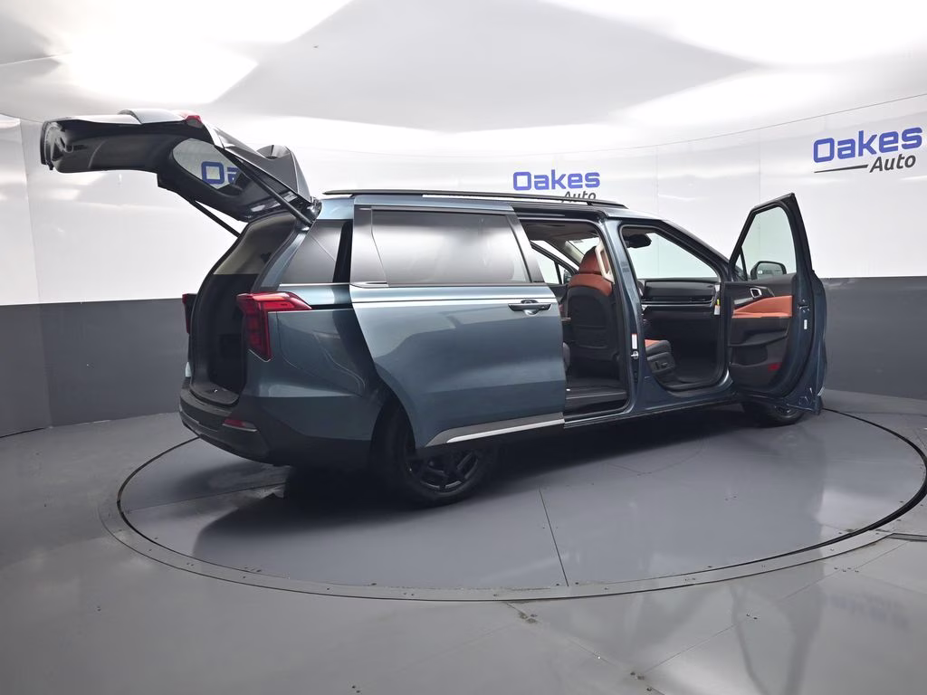 2026 Astra Blue Kia Carnival Hybrid SX FWD Van