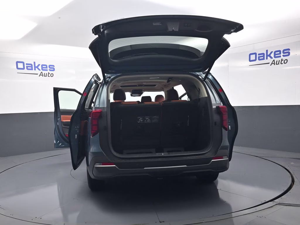 2026 Astra Blue Kia Carnival Hybrid SX FWD Van