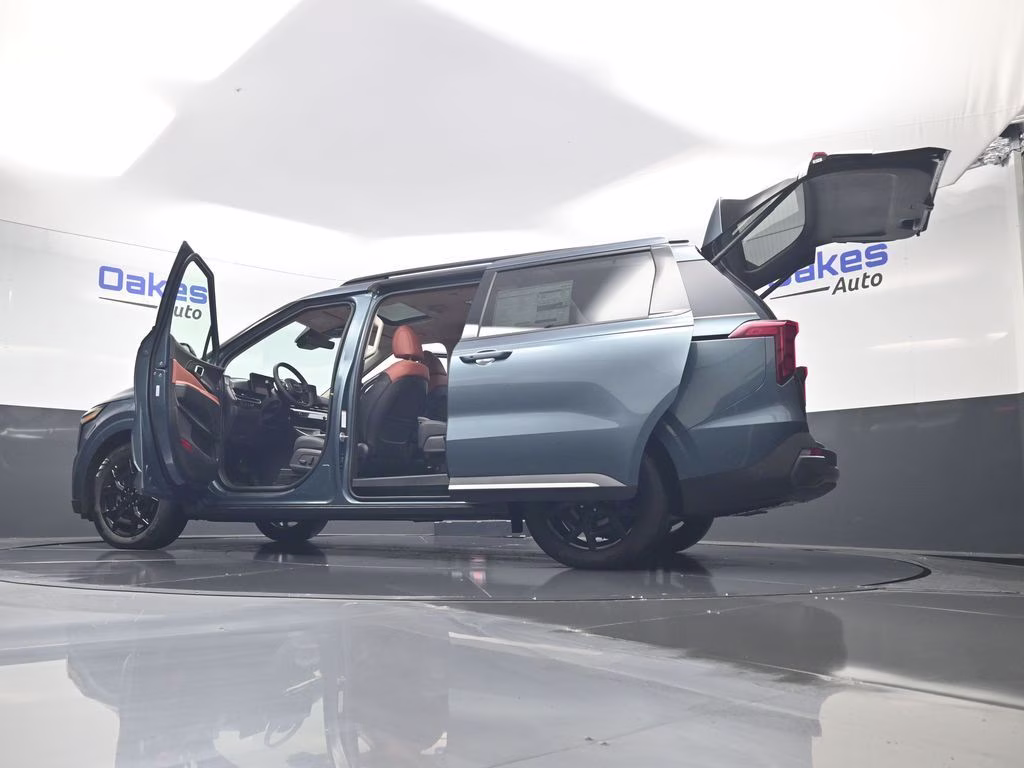 2026 Astra Blue Kia Carnival Hybrid SX FWD Van