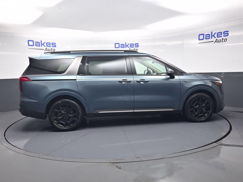 2026 Astra Blue Kia Carnival Hybrid SX FWD Van