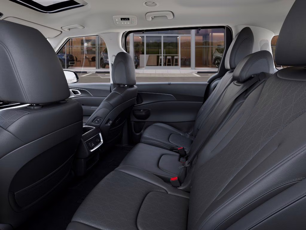 2026 Aurora Black Pearl Kia Carnival Hybrid SX FWD Van