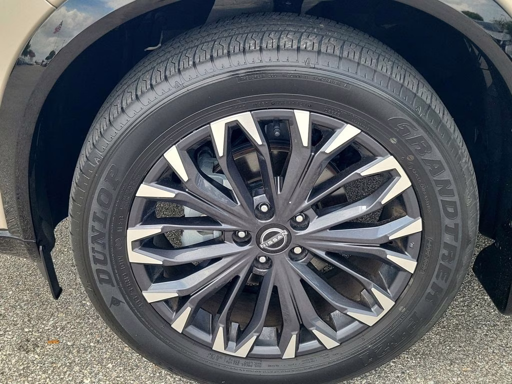 2024 Champagne Silver Metallic Nissan Rogue Platinum FWD SUV