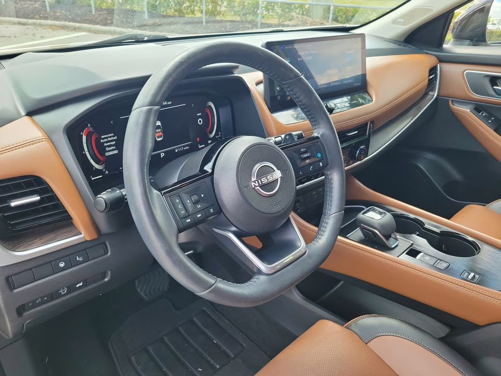 2024 Champagne Silver Metallic Nissan Rogue Platinum FWD SUV