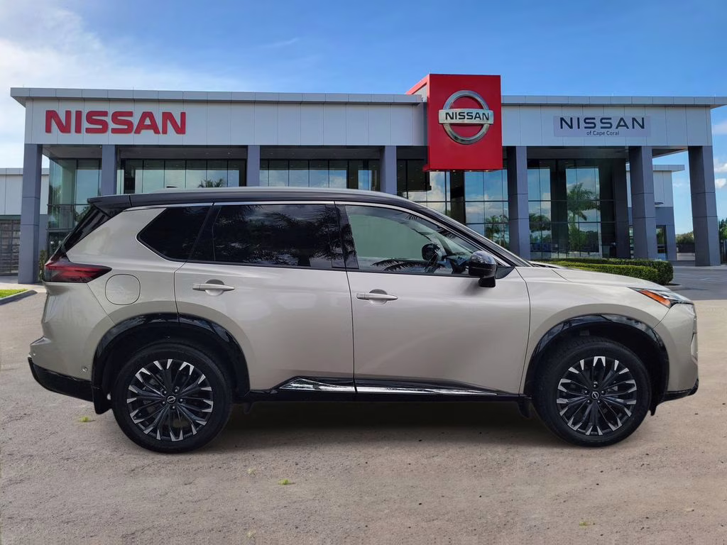 2024 Champagne Silver Metallic Nissan Rogue Platinum FWD SUV