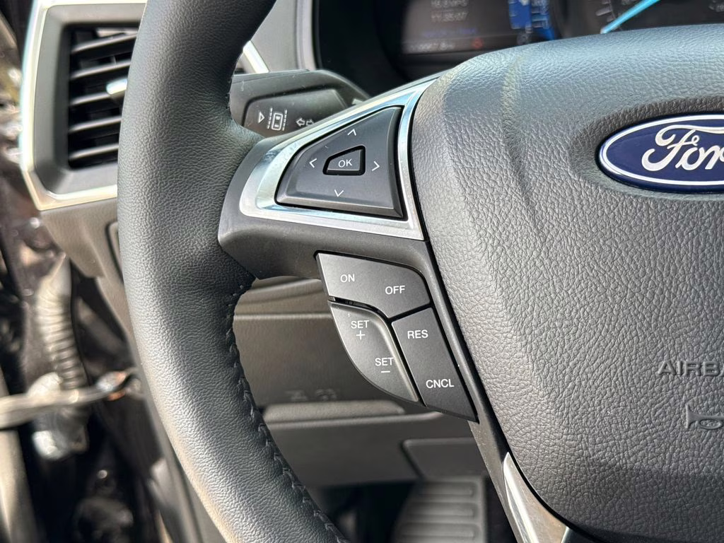 2024 Agate Black Metallic Ford Edge Titanium AWD SUV
