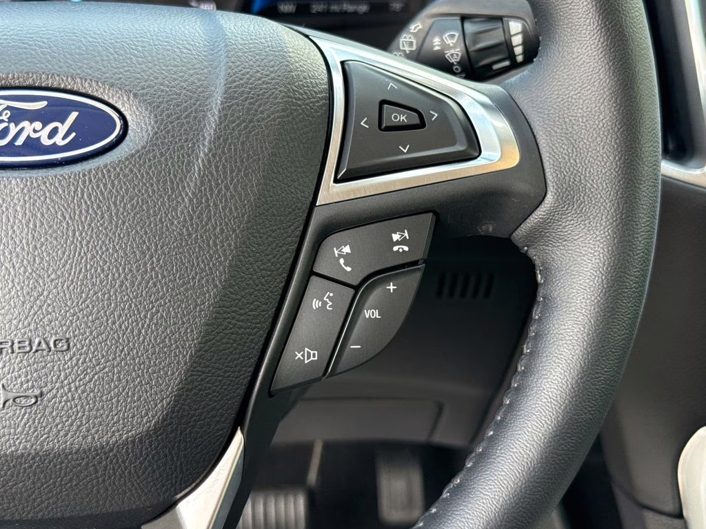 2024 Agate Black Metallic Ford Edge Titanium AWD SUV
