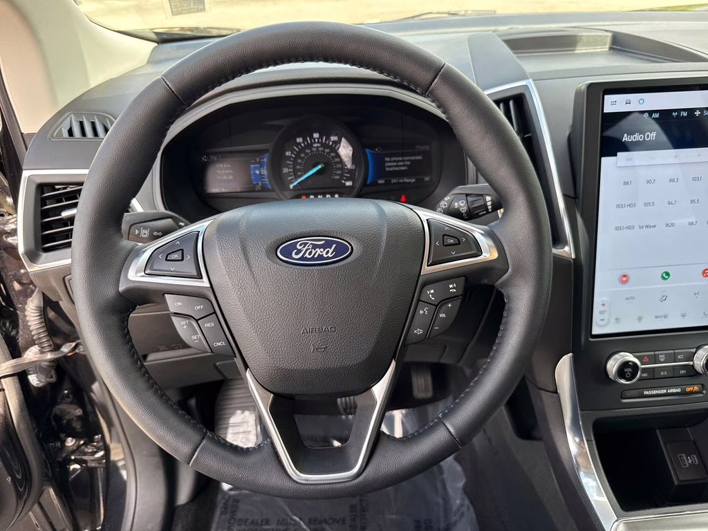 2024 Agate Black Metallic Ford Edge Titanium AWD SUV