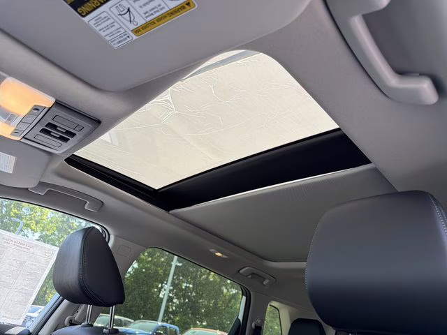 2026 Everest White Pearl Tricoat Nissan Rogue Dark Armor AWD SUV