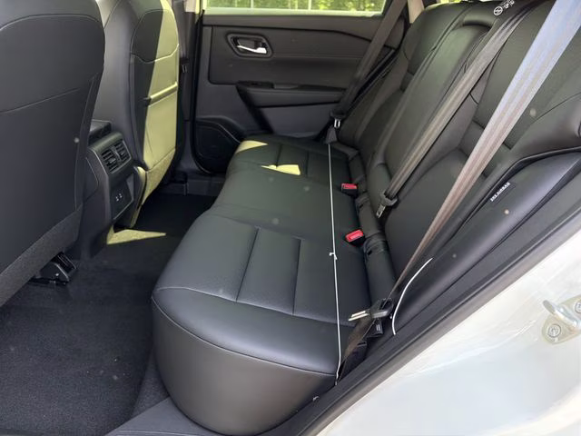 2026 Everest White Pearl Tricoat Nissan Rogue Dark Armor AWD SUV
