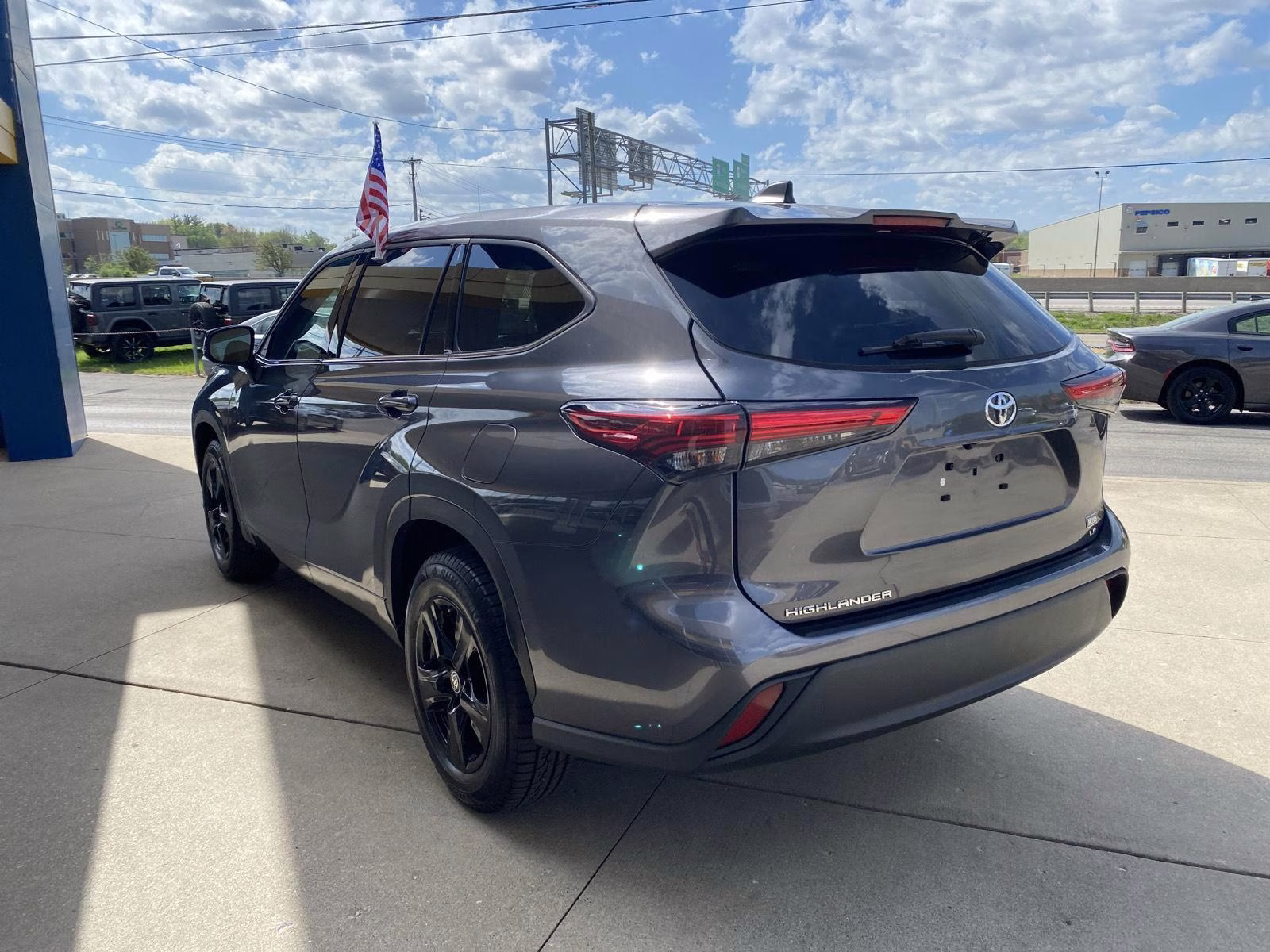 2022 Magnetic Gray Metallic Toyota Highlander LE FWD SUV