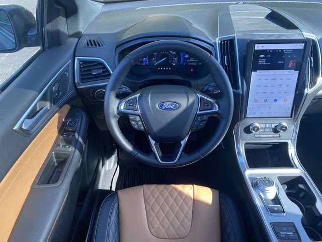 2024 Carbonized Gray Metallic Ford Edge Titanium AWD SUV