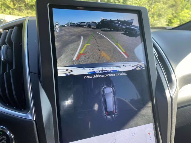 2024 Carbonized Gray Metallic Ford Edge Titanium AWD SUV