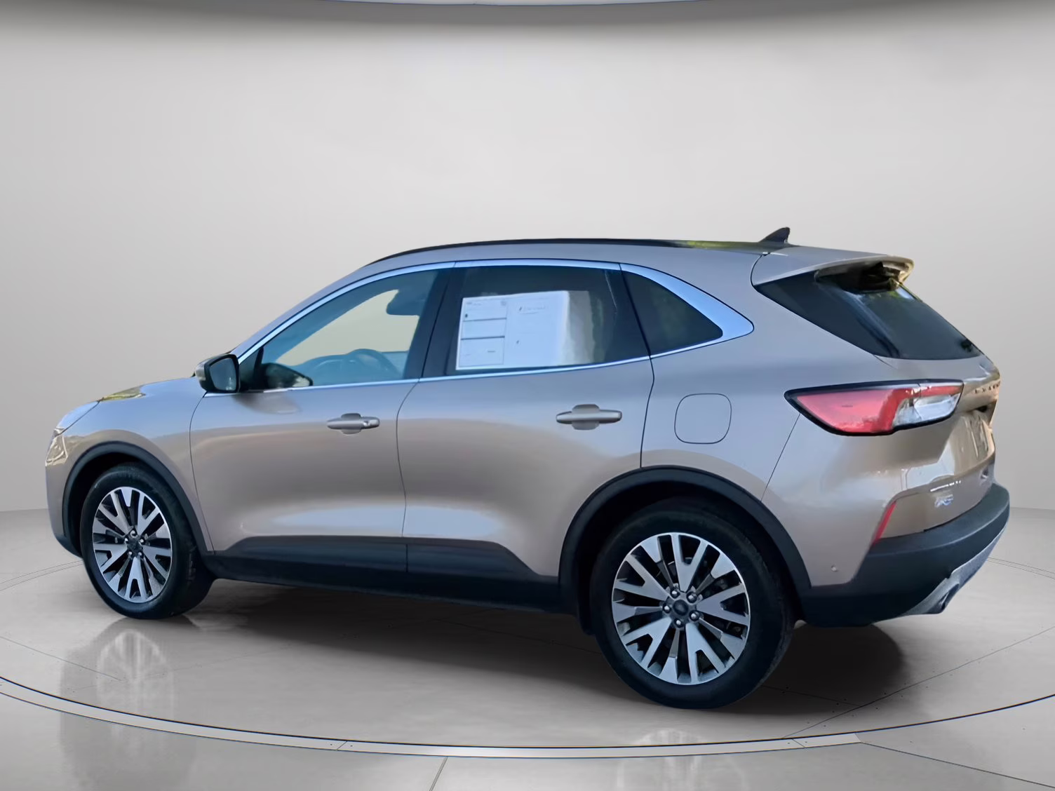 2020 Desert Gold Metallic Ford Escape Titanium Hybrid FWD SUV