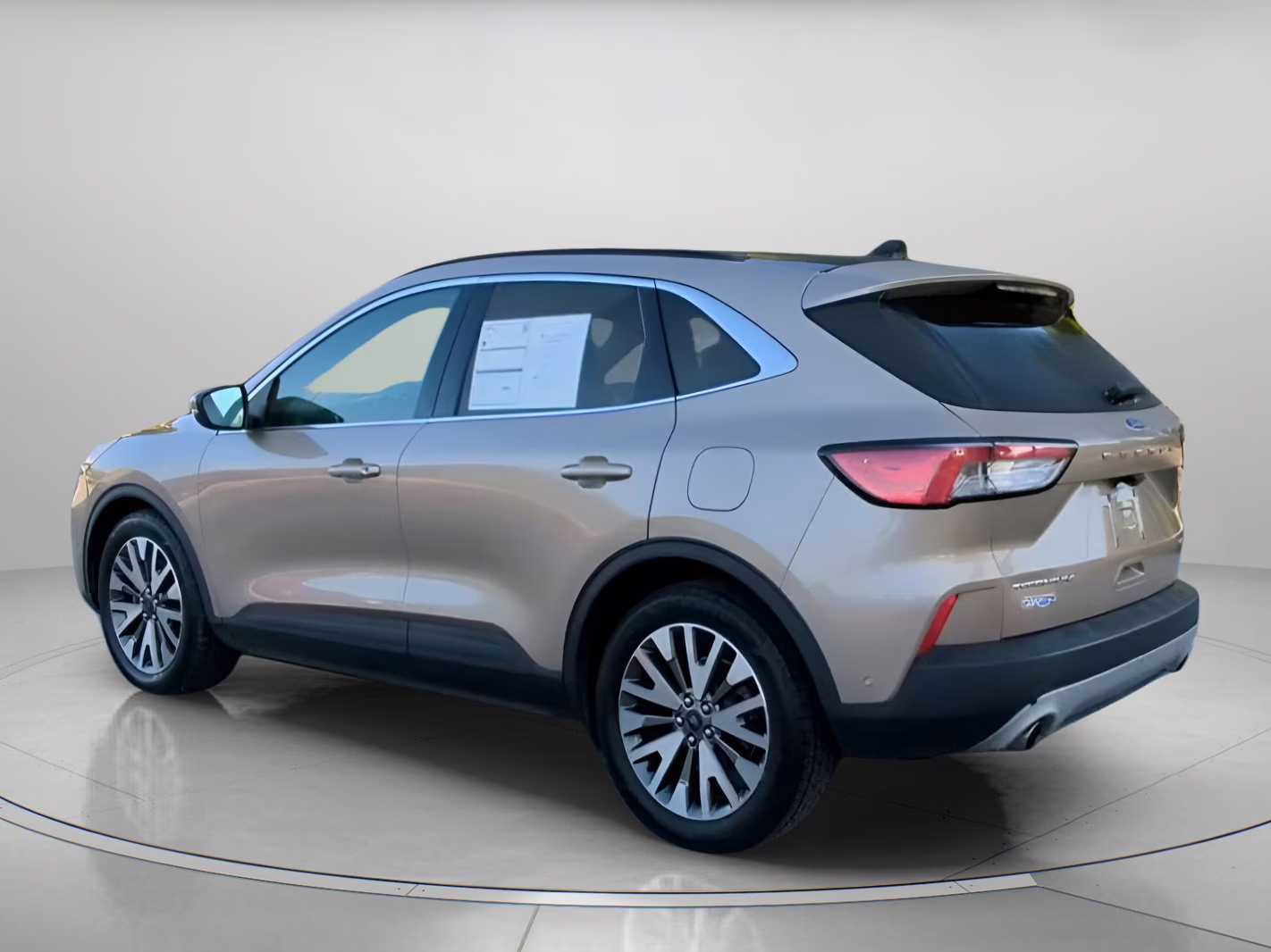 2020 Desert Gold Metallic Ford Escape Titanium Hybrid FWD SUV