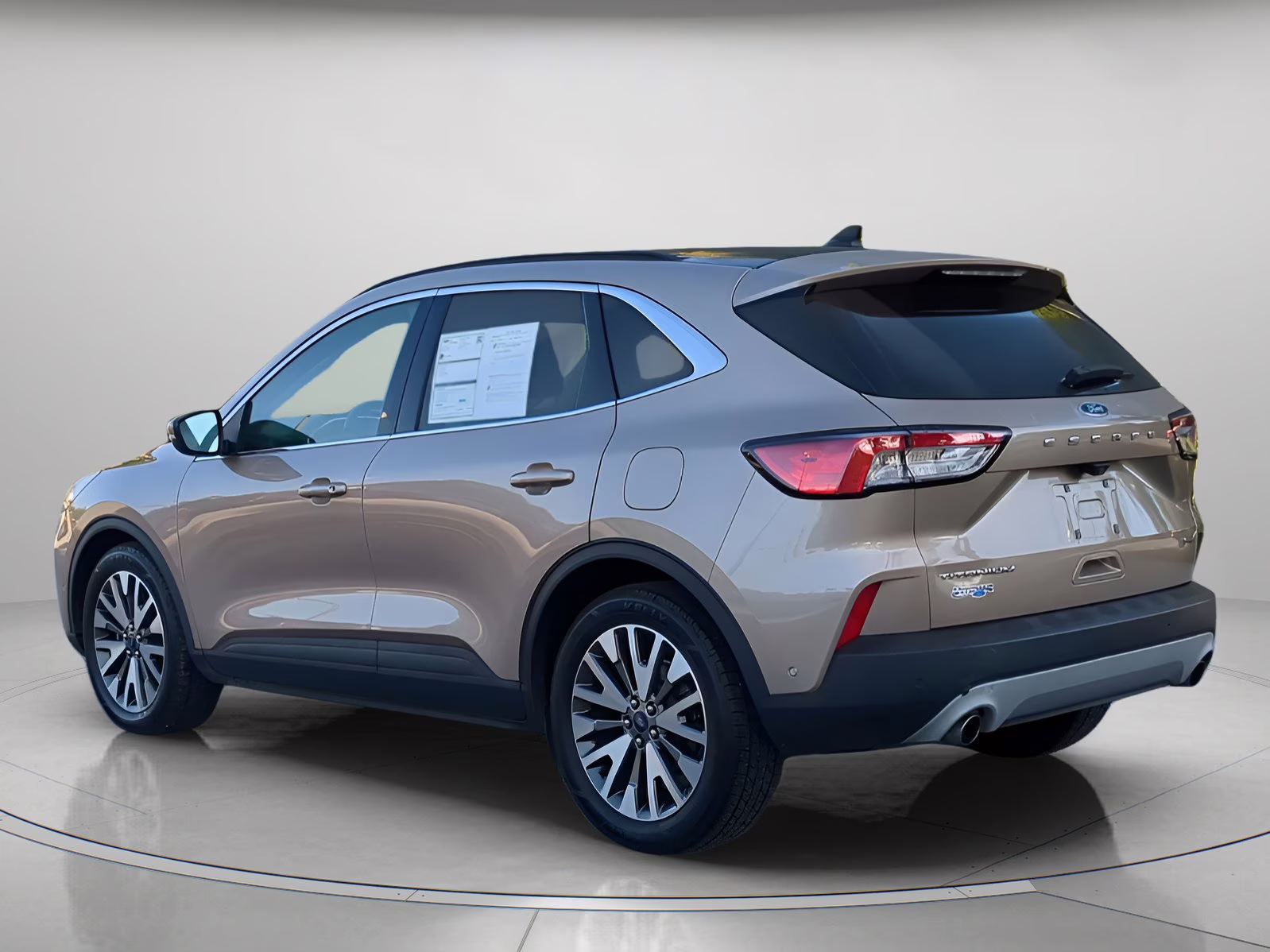 2020 Desert Gold Metallic Ford Escape Titanium Hybrid FWD SUV
