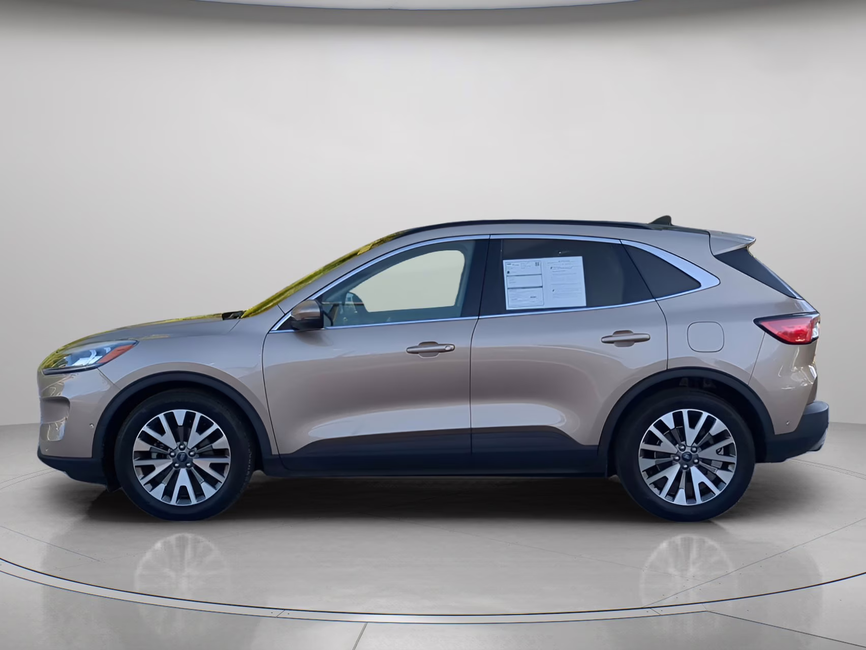 2020 Desert Gold Metallic Ford Escape Titanium Hybrid FWD SUV