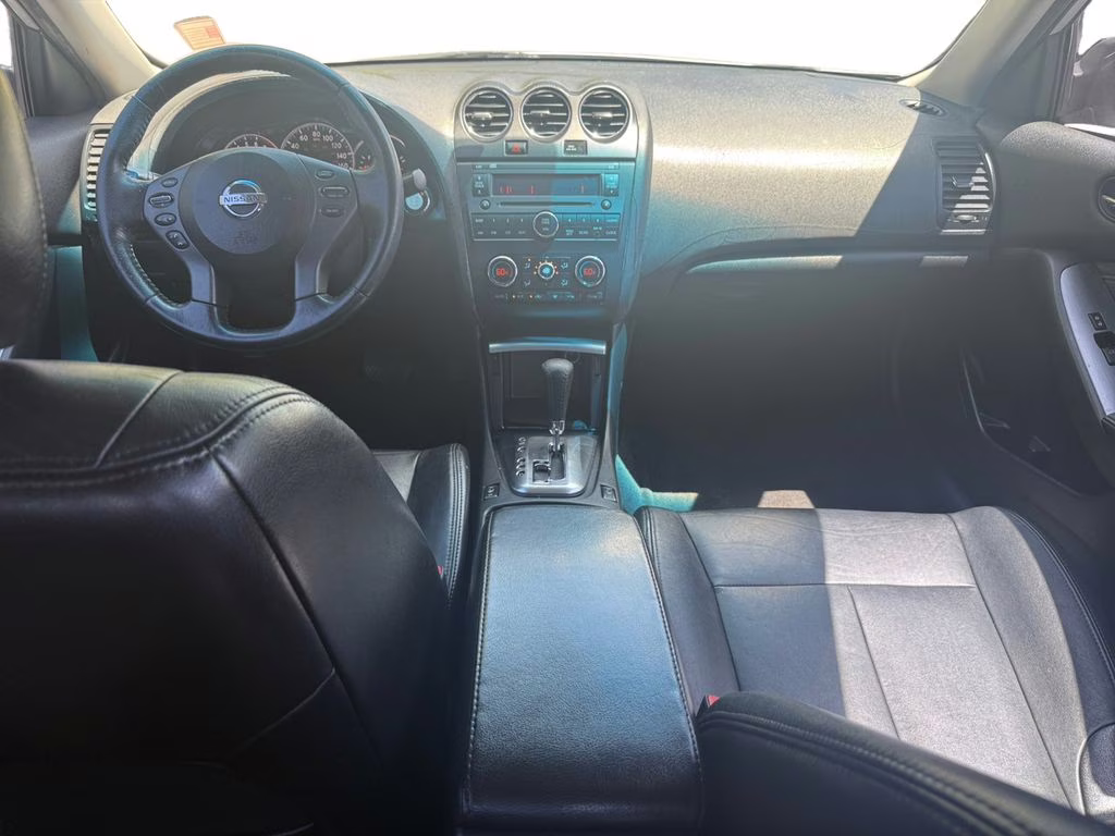 2012 Brilliant Silver Metallic Nissan Altima 2.5 SL FWD Sedan