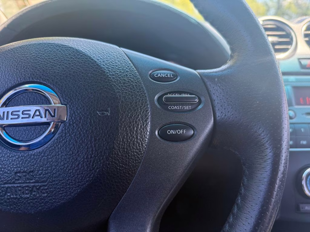 2012 Brilliant Silver Metallic Nissan Altima 2.5 SL FWD Sedan