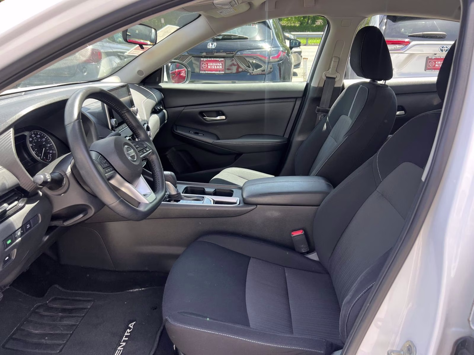 2023 White Nissan Sentra SV FWD Sedan