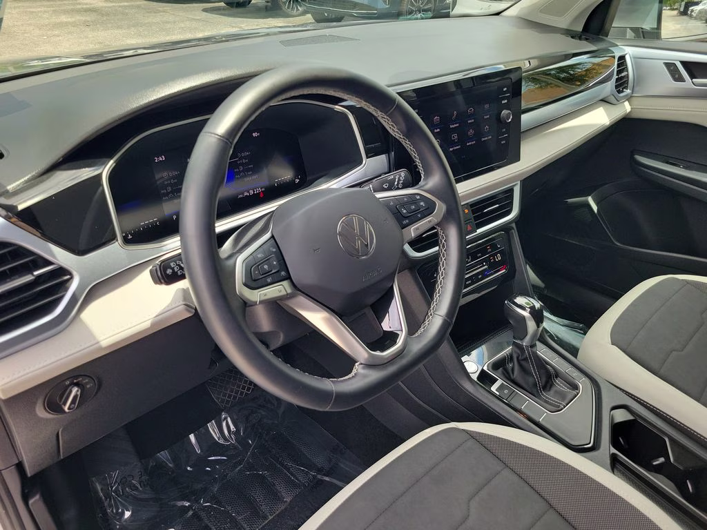 2025 Pyrite Silver Metallic Volkswagen Taos SE FWD SUV