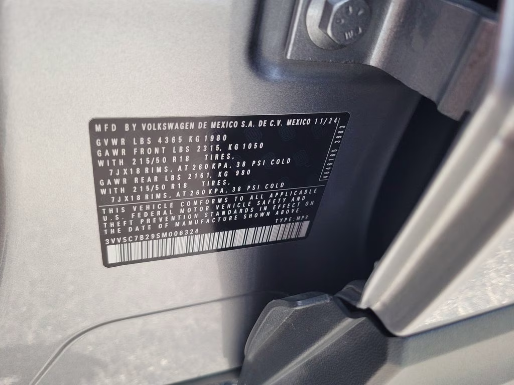 2025 Pyrite Silver Metallic Volkswagen Taos SE FWD SUV