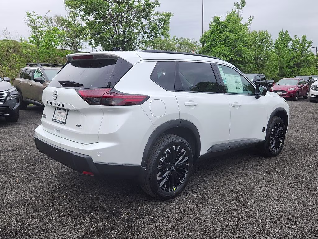 2026 Everest White Pearl Tricoat Nissan Rogue Dark Armor AWD SUV