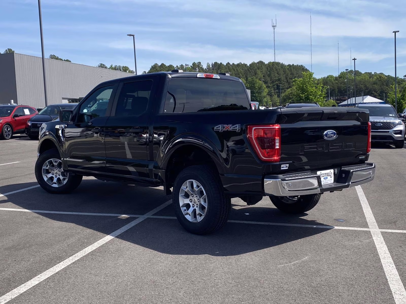 2023 Agate Black Metallic Ford F-150 XLT 4X4 Truck