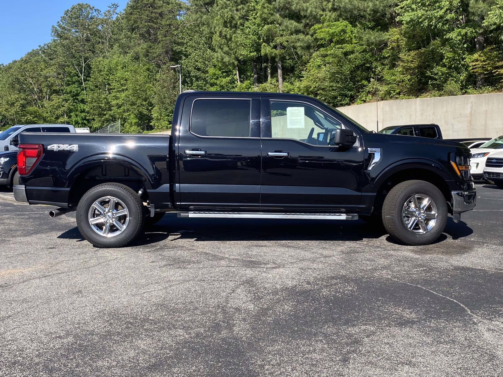 2024 Agate Black Metallic Ford F-150 XLT 4X4 Truck