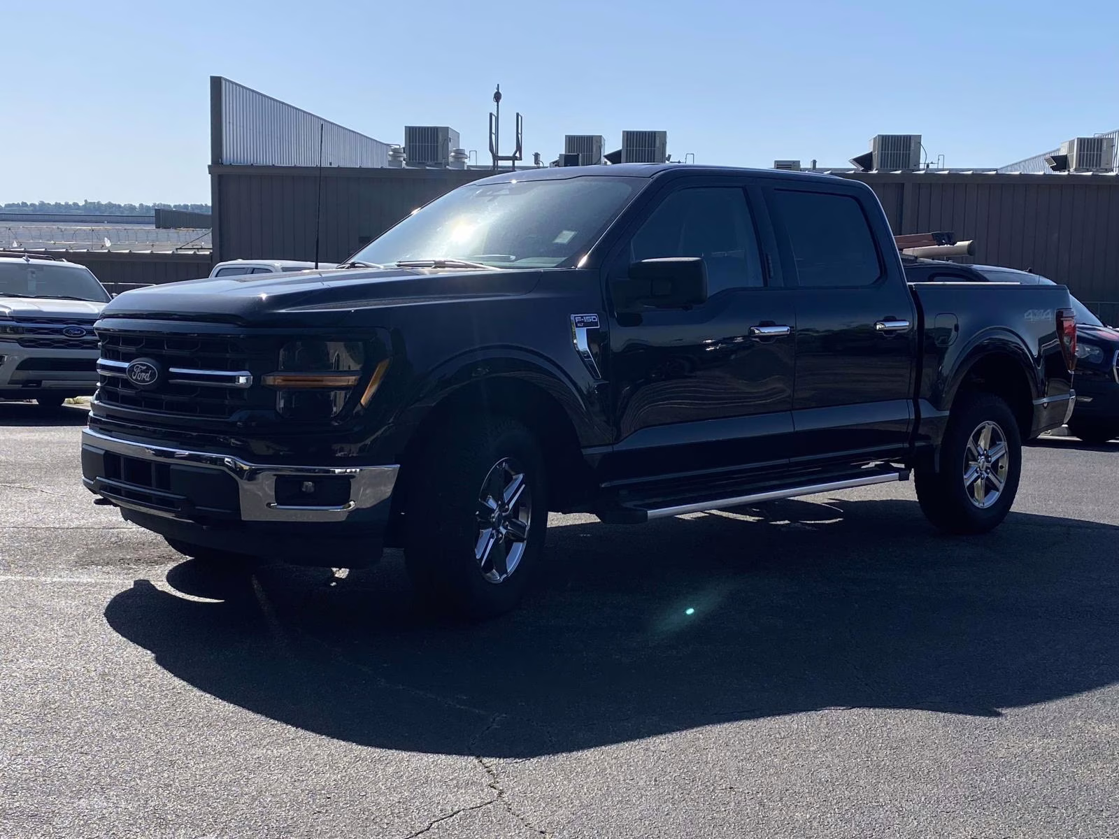 2024 Agate Black Metallic Ford F-150 XLT 4X4 Truck