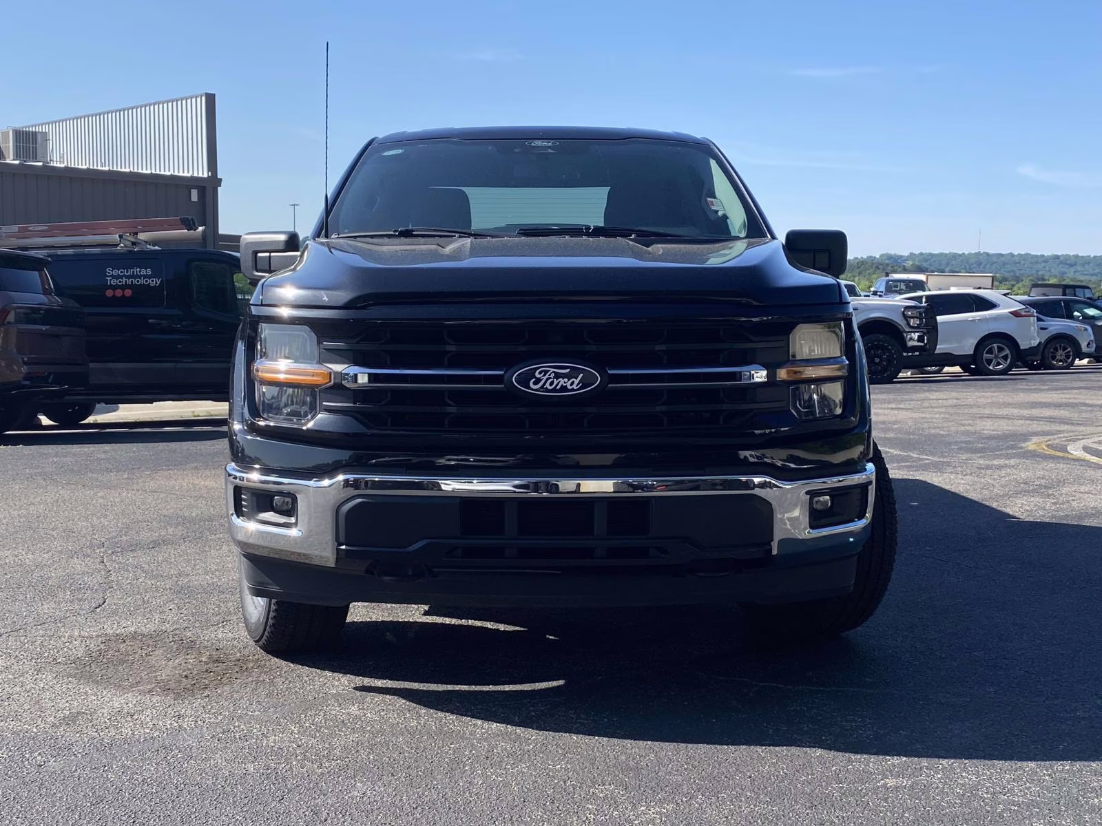 2024 Agate Black Metallic Ford F-150 XLT 4X4 Truck