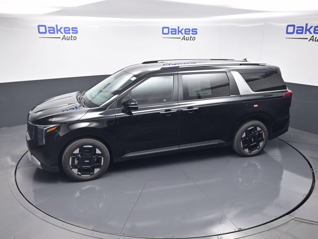 2026 Aurora Black Pearl Kia Carnival EX FWD Van
