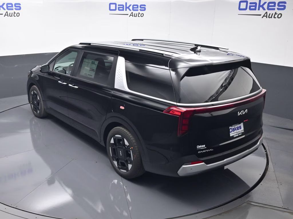 2026 Aurora Black Pearl Kia Carnival EX FWD Van