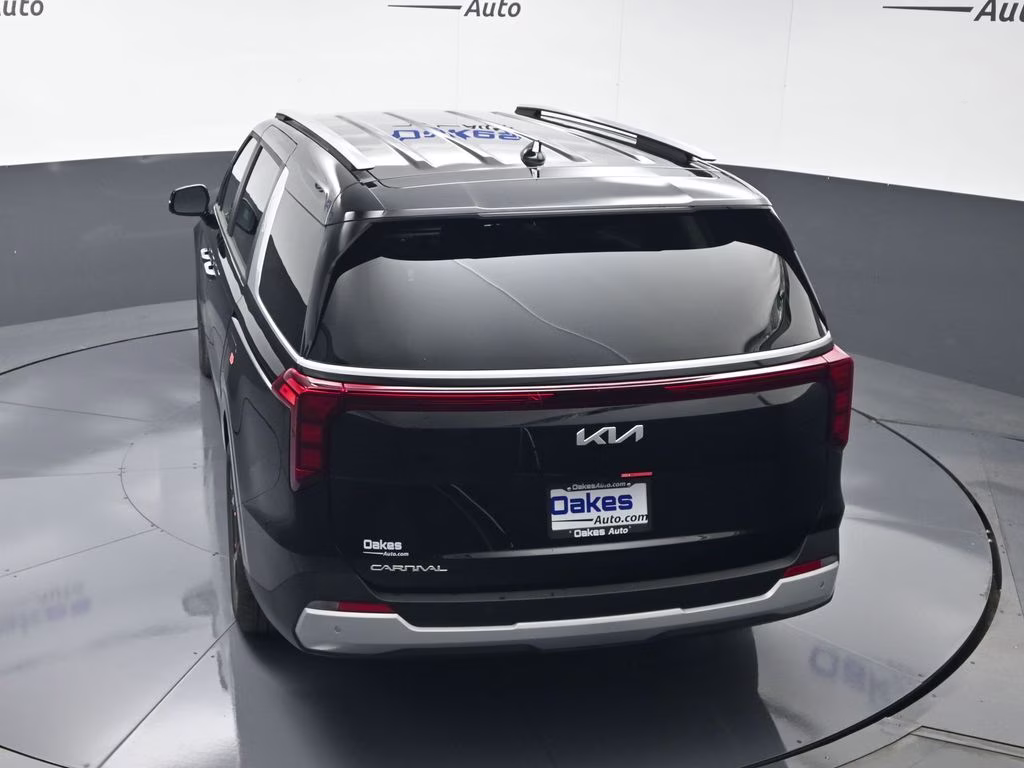 2026 Aurora Black Pearl Kia Carnival EX FWD Van
