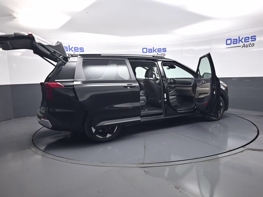 2026 Aurora Black Pearl Kia Carnival EX FWD Van
