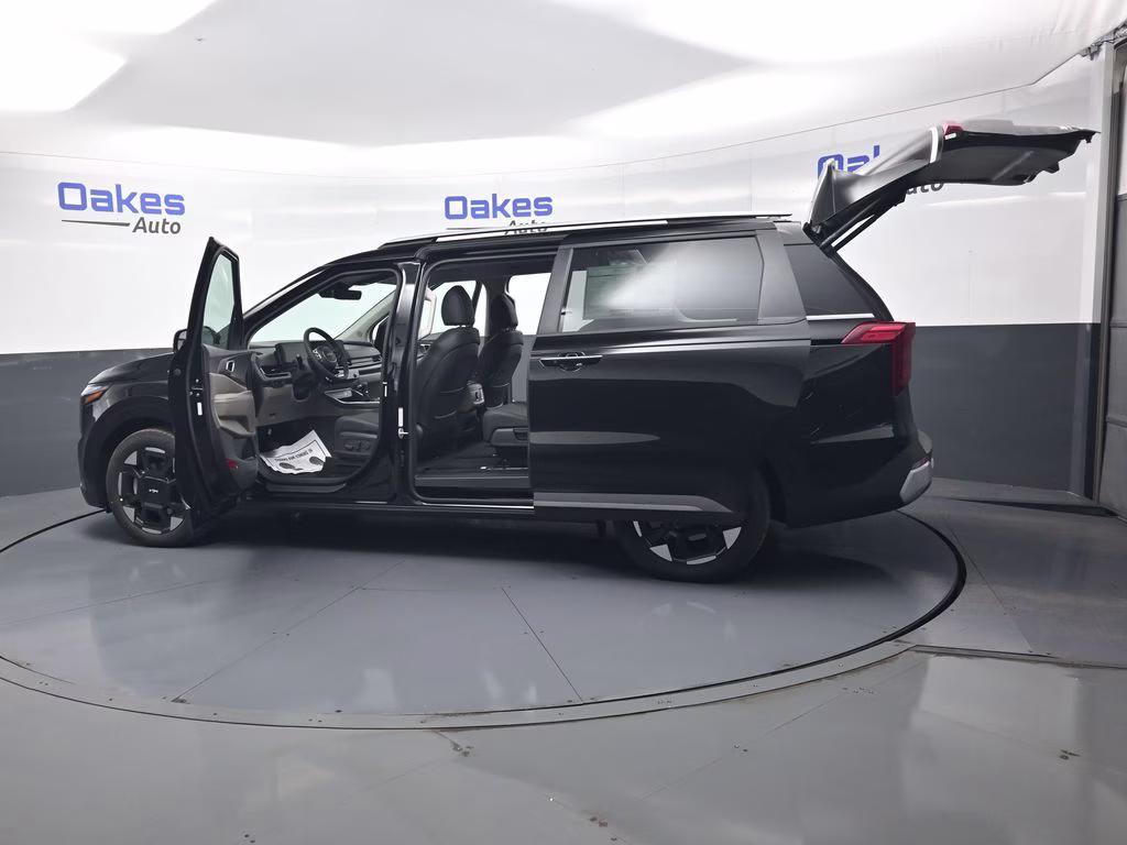 2026 Aurora Black Pearl Kia Carnival EX FWD Van