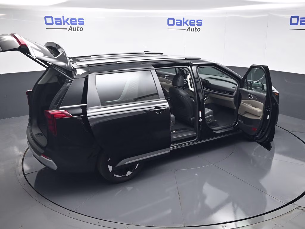 2026 Aurora Black Pearl Kia Carnival EX FWD Van