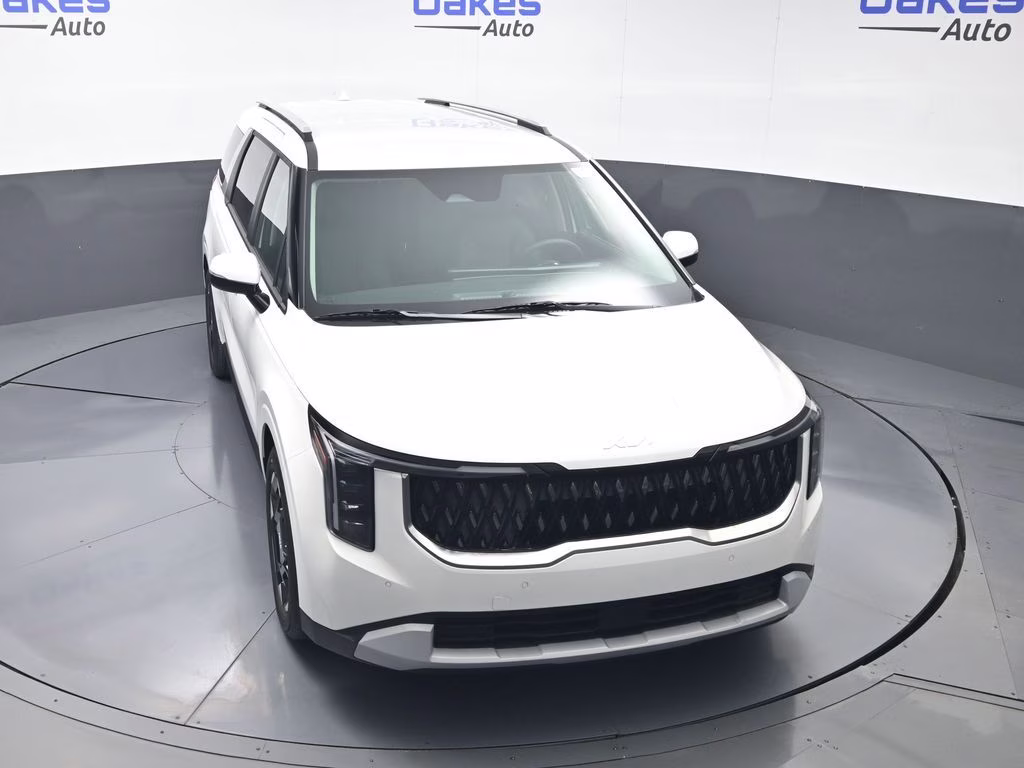2026 Snow White Pearl Kia Carnival EX FWD Van