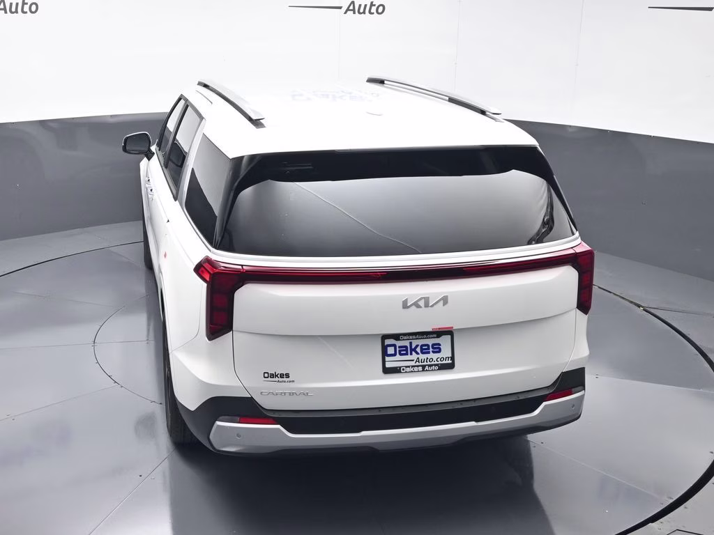 2026 Snow White Pearl Kia Carnival EX FWD Van