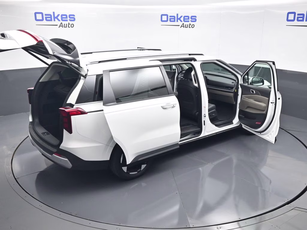 2026 Snow White Pearl Kia Carnival EX FWD Van