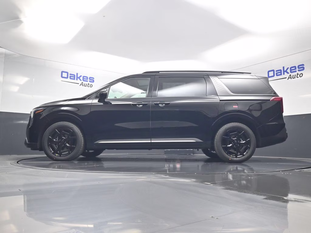 2026 Aurora Black Pearl Kia Carnival Hybrid SX FWD Van